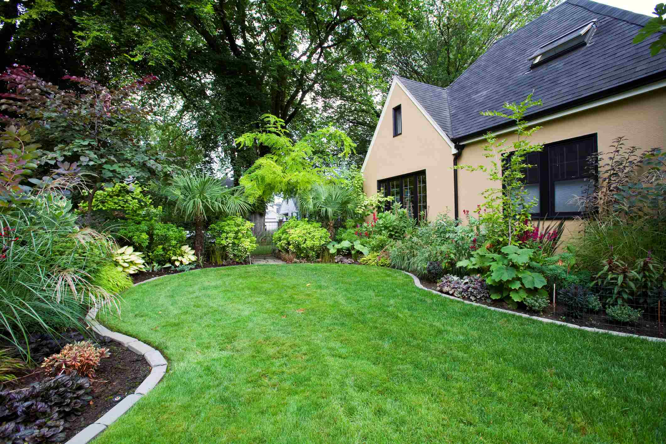 How To Flatten Sloped Backyard